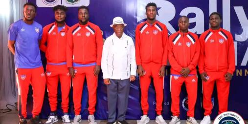 President Boakai in a photoshoot with national team players